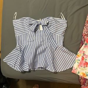 Bebe peplum sleeveless top sz small